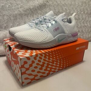 Nike Women White Sneaker size 9.5 and 10 available